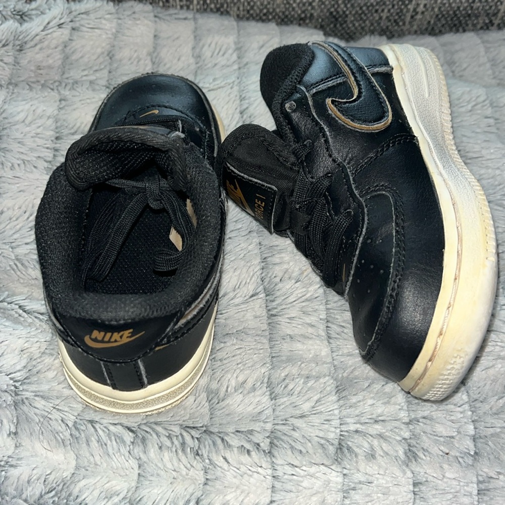 Unisex size 7, black Air Force ones